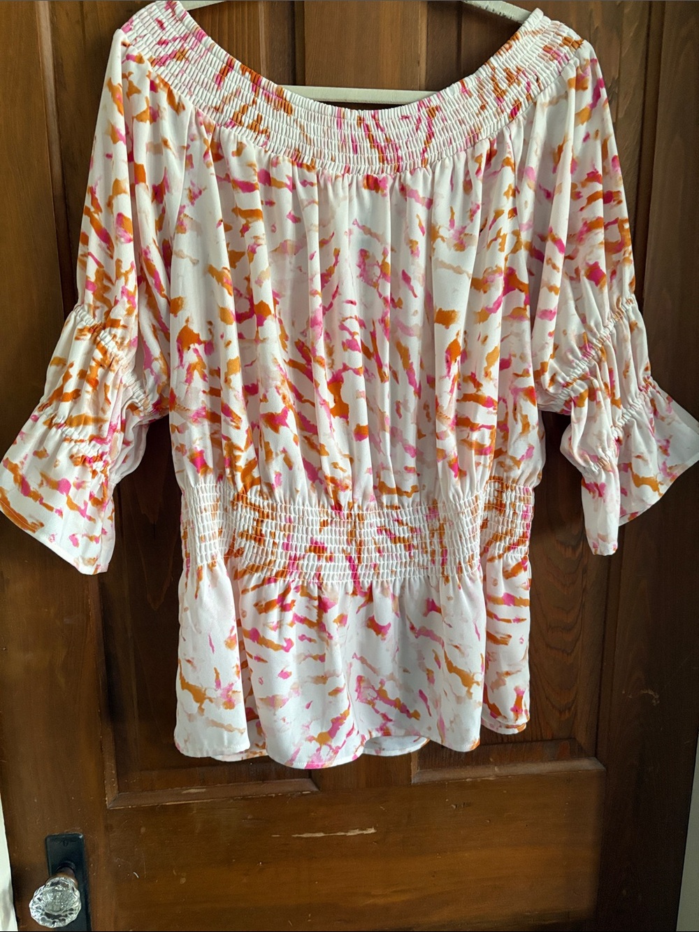 CAbi Off-Shoulder Smocked Waist Blouse — White with Pink & Orange Print